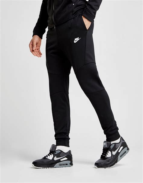 fake nike tech pants|nike tech pants for men.